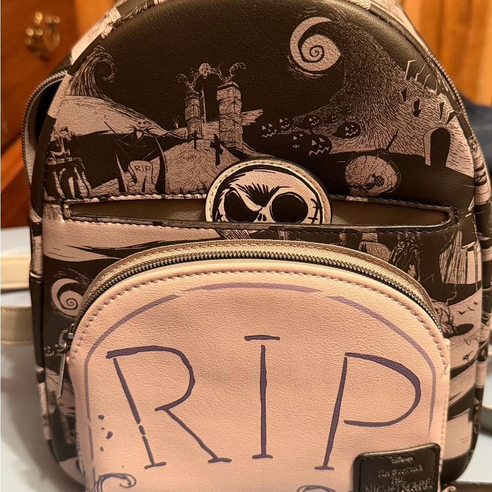 Loungefly Black and Pink Nightmare Before Christmas Backpack and wallet